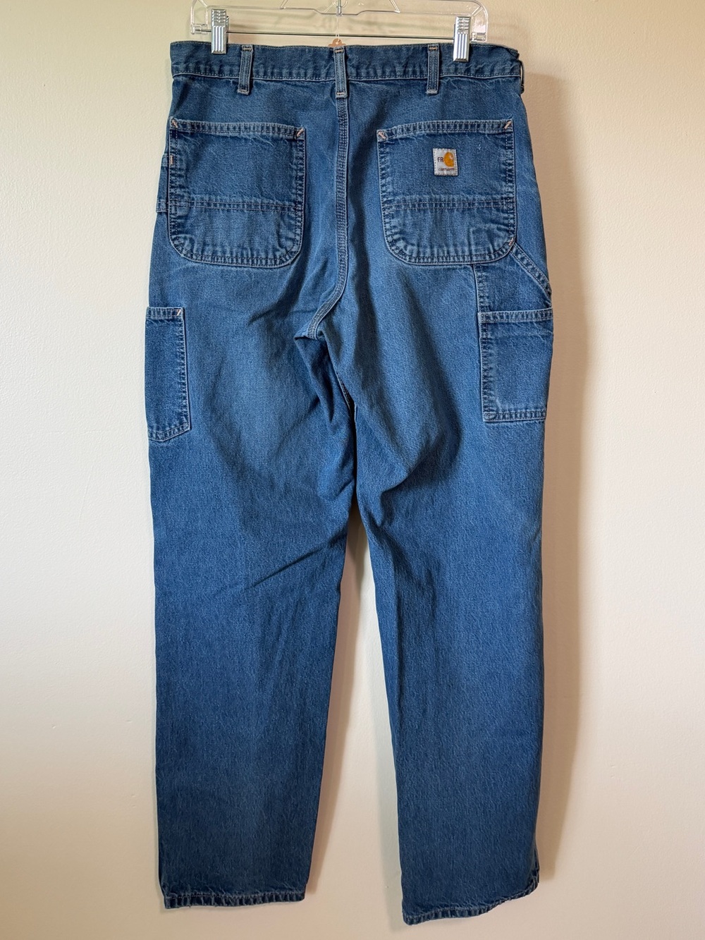 Carhartt FR medium wash blue denim carpenter jeans 100% cotton size 34x34